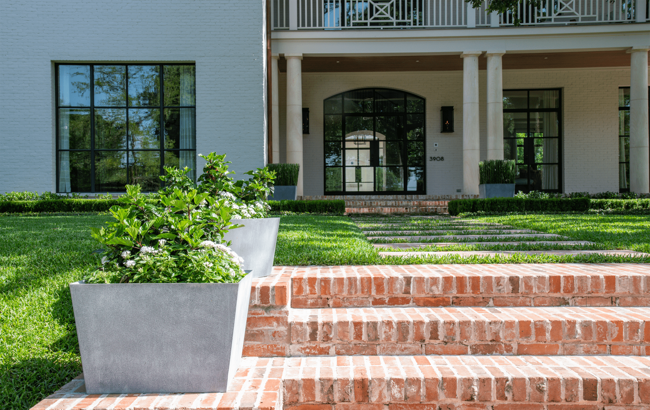 residential brick stairs hardscape container planting lawn