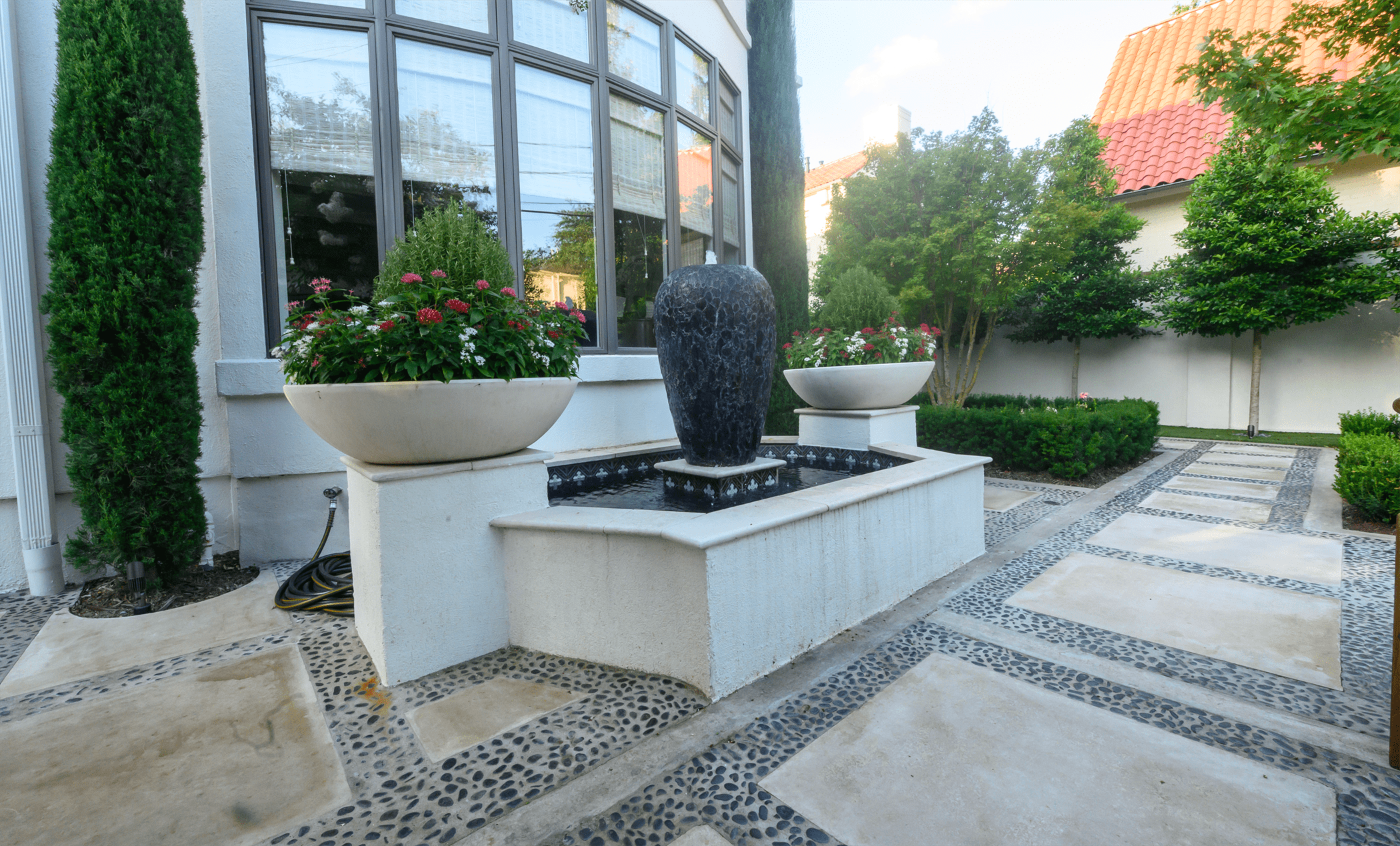 residential courtyard raised planters slab walkway hardscape